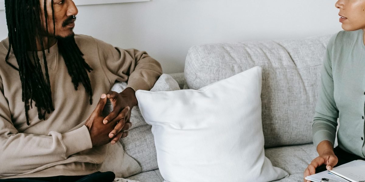 A person engaging in an open and comfortable conversation with a mental health professional.