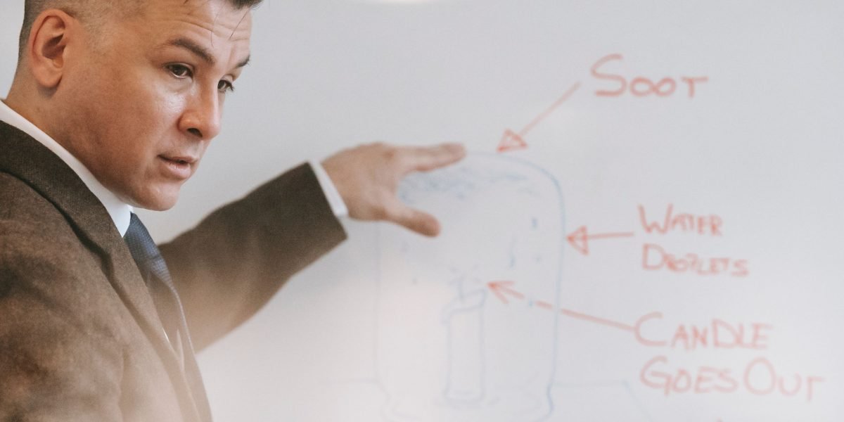 A person intently listening or comprehending a complex explanation, symbolizing understanding the brain's mechanisms.
