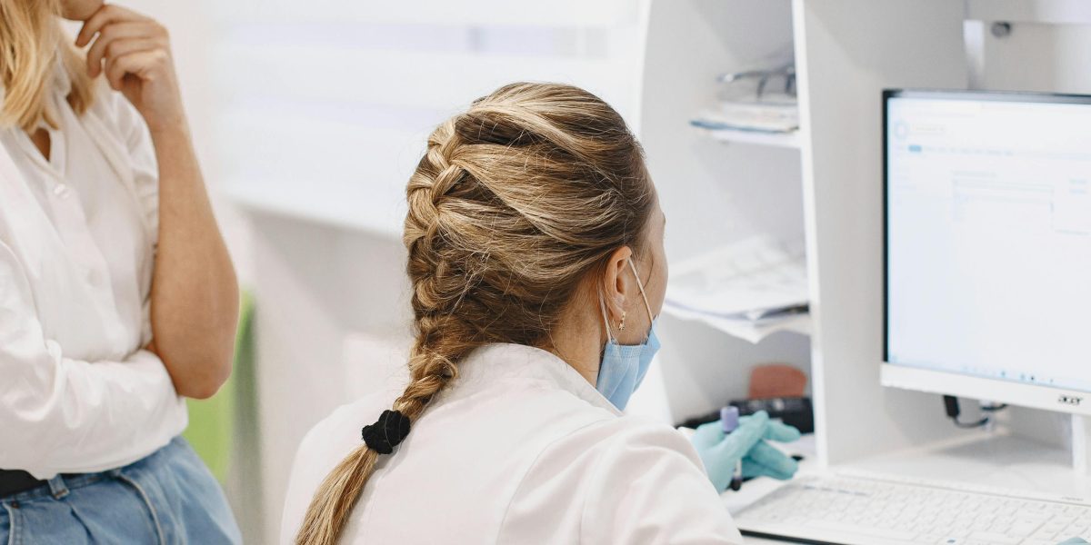 A patient and doctor engaged in a collaborative discussion, symbolizing shared decision-making in healthcare.