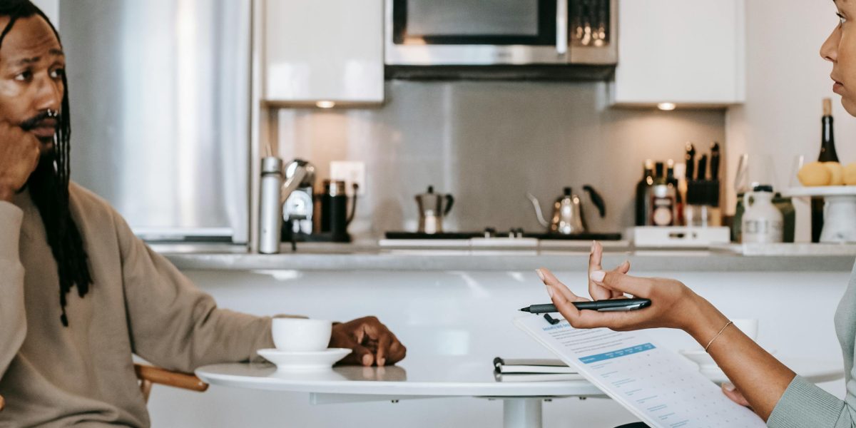A patient discussing their symptoms and potential treatment options with a healthcare professional.