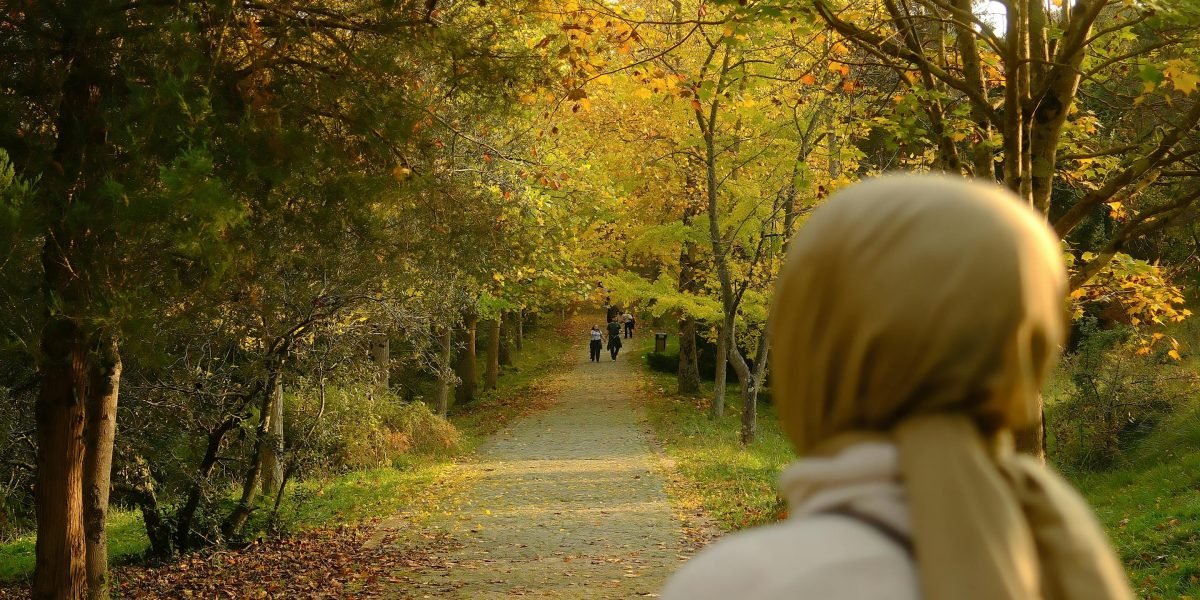 A person engaging in a calming activity or lifestyle change, symbolizing a holistic approach to mental well-being.