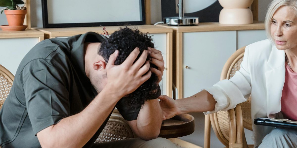 A therapy session illustrating the confidential and supportive environment crucial for PPD treatment.