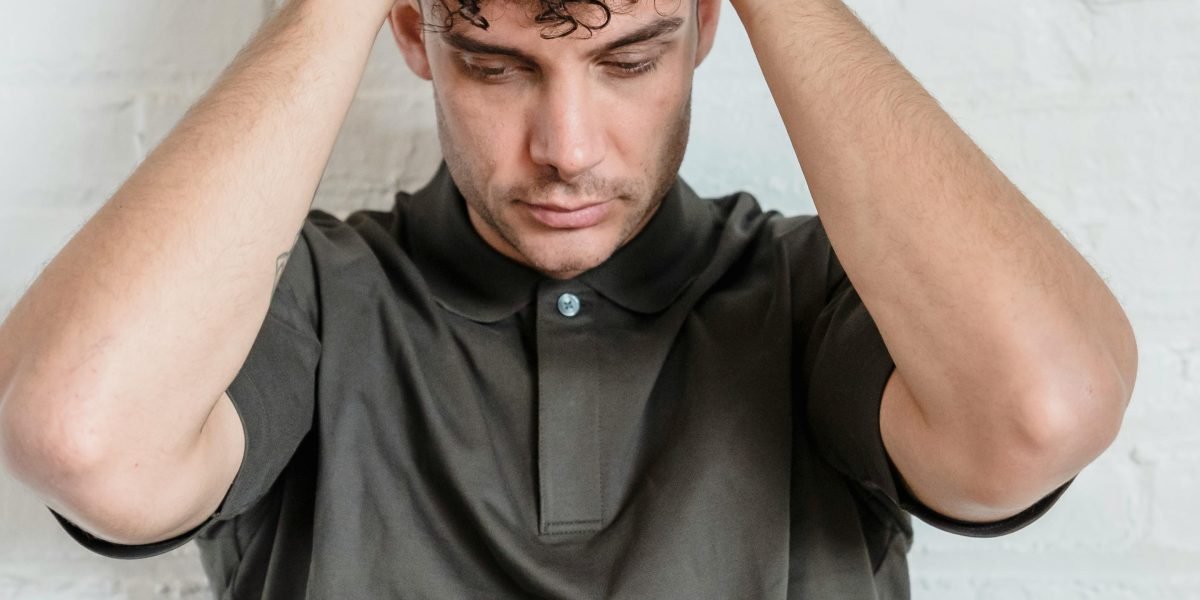 A person experiencing a feeling of dread or being overwhelmed.