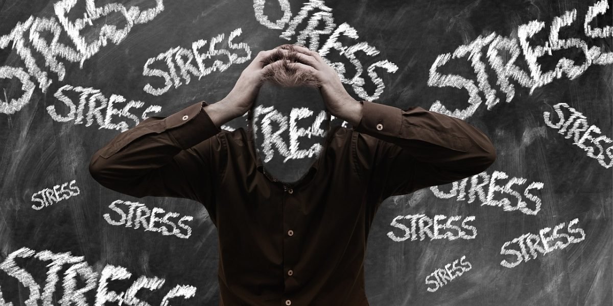 A person experiencing feelings of overwhelming fear and stress.