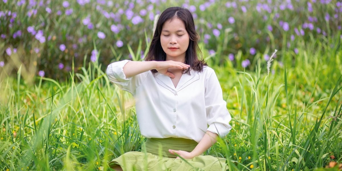 Engaging in mindful breathing, a person finds calm through simple, accessible coping techniques.