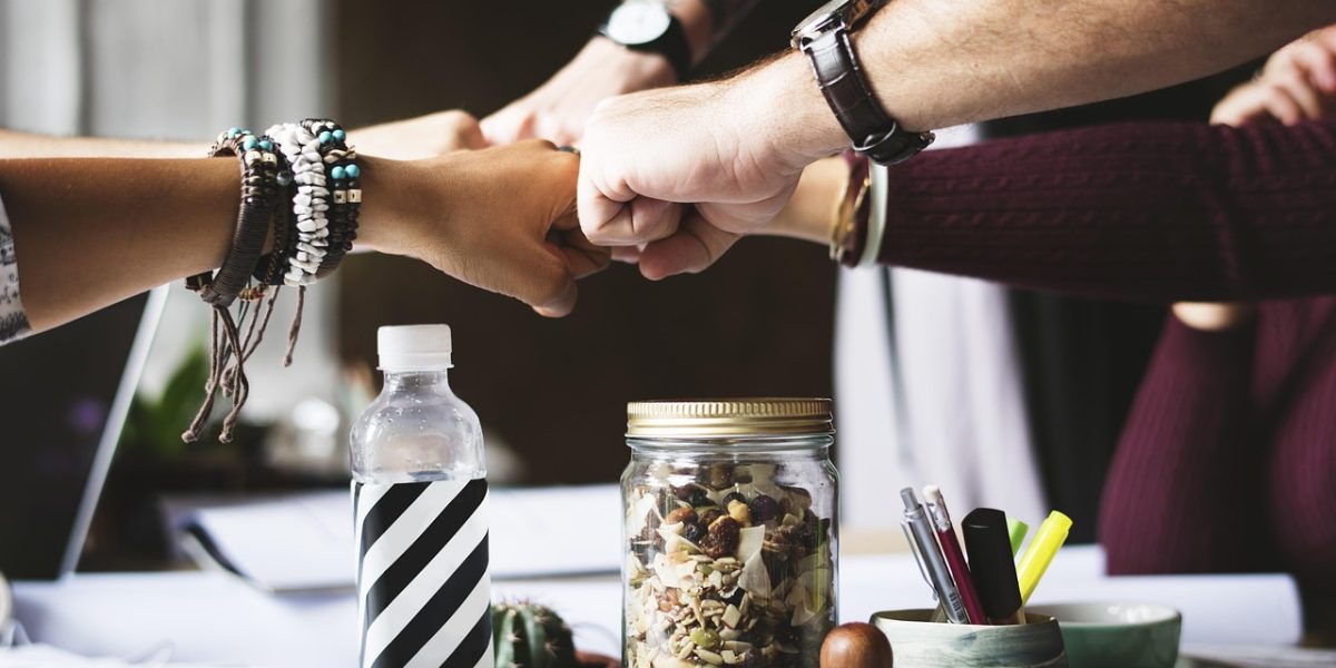 Individuals in a support group session, sharing experiences and offering mutual encouragement.