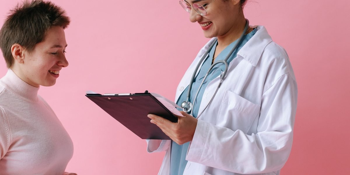 A person consulting with a healthcare professional, emphasizing the importance of medical advice before taking supplements.
