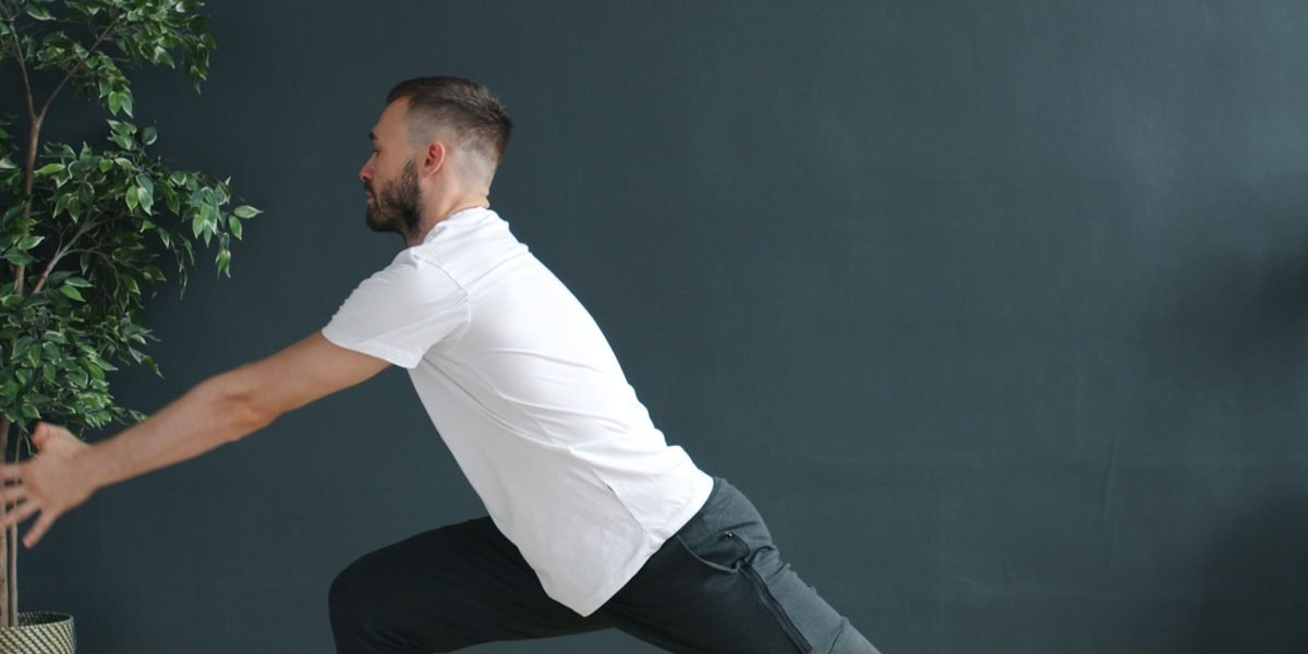 A person engaging in a calm, healthy routine at home, emphasizing the role of lifestyle in managing bipolar disorder.