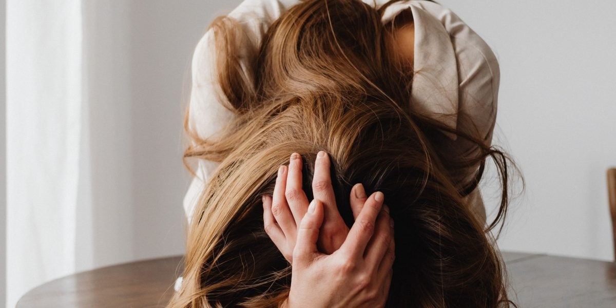 An individual feeling emotionally drained despite constantly giving to others, a common experience in codependency.