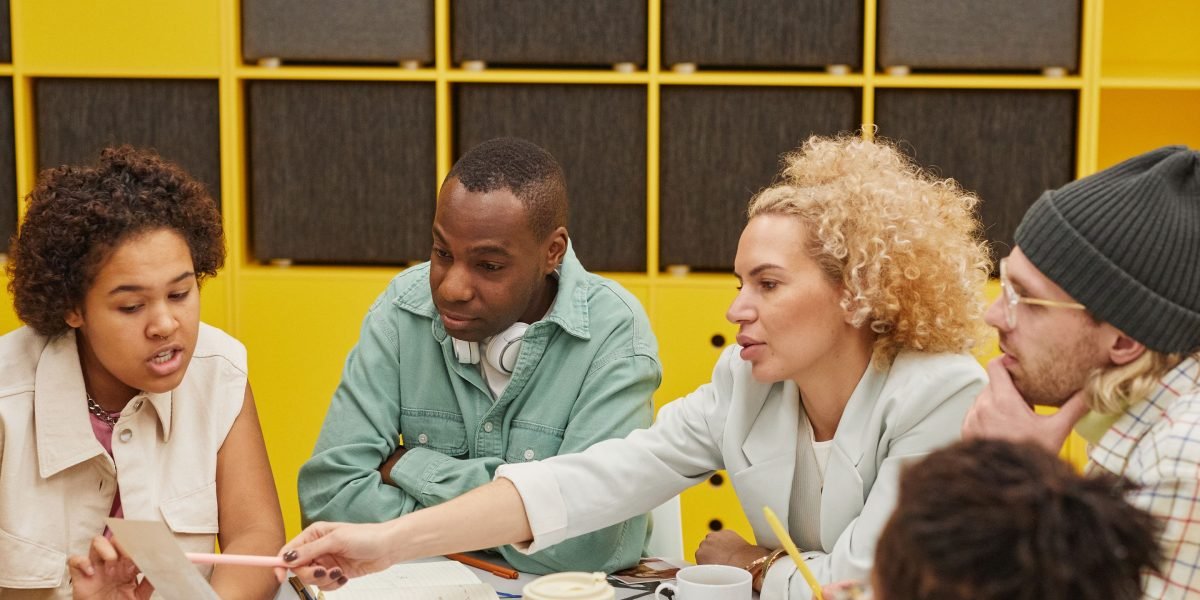 A diverse group of individuals collaborating in a welcoming and empathetic environment, emphasizing inclusivity.