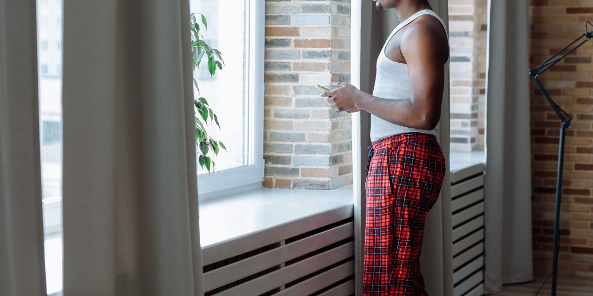 A person in a moment of quiet reflection, illustrating the common experience of worry.
