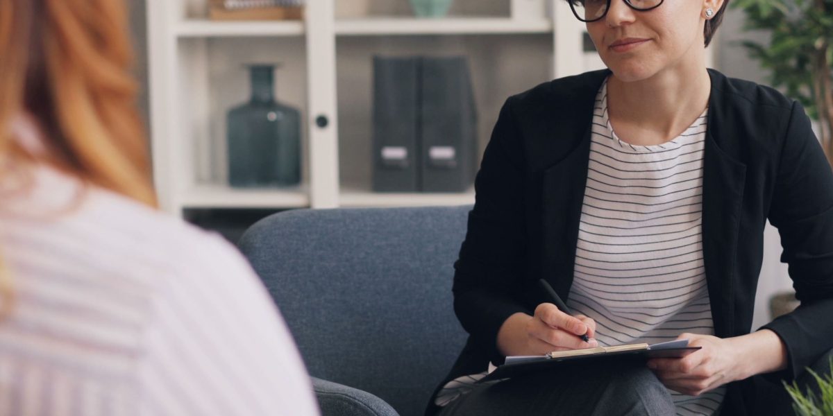 A person consulting with a professional, emphasizing the importance of seeking expert help for anxiety.